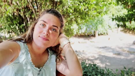 happy young tourist woman vlogging serene moments in athens park