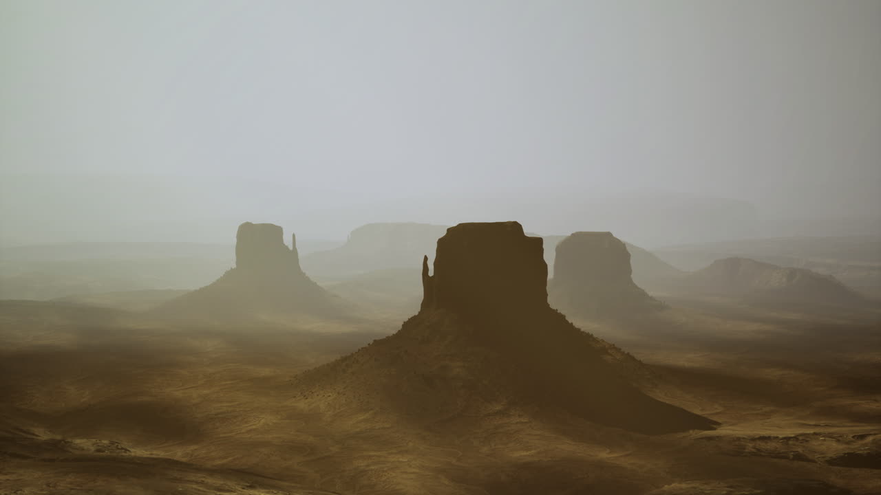 Dusk illuminates unique rock formations in monument valleys landscape