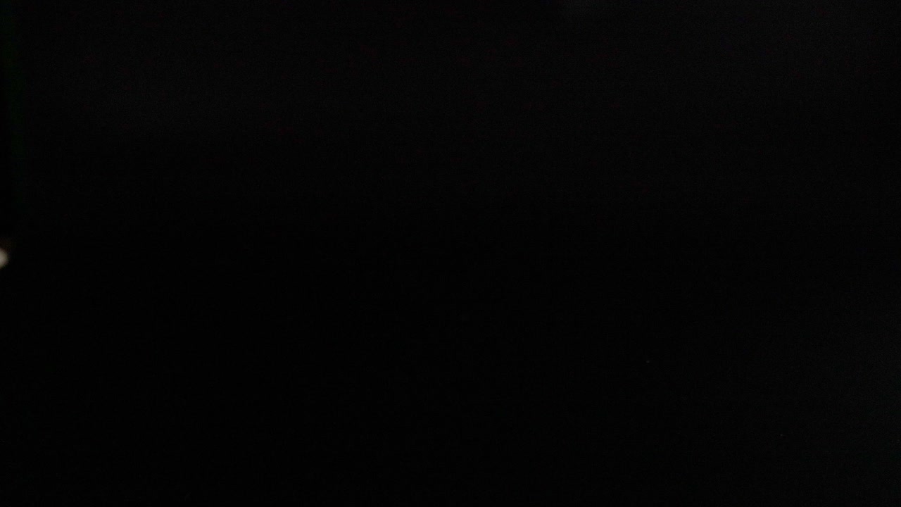 Soccer ball bouncing on a dark surface
