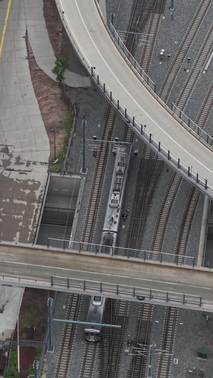 Aerial view of railroad tracks and trains with bridges