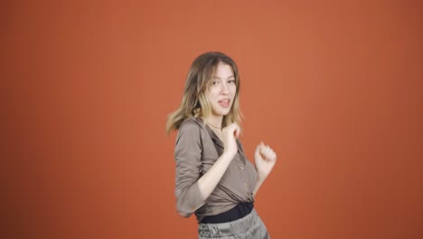 happy young woman dancing.