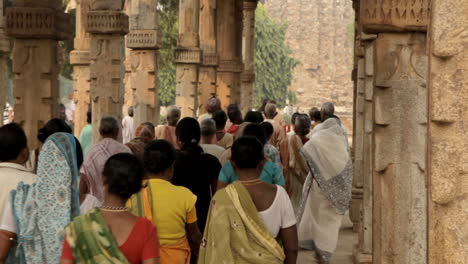 A-large-group-of-people-walk-together