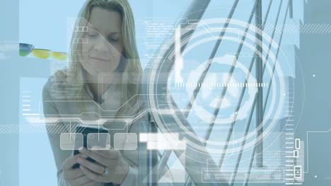 using smartphone, woman with futuristic interface over modern architecture background