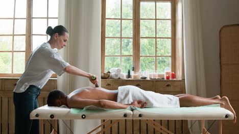 man laying upside down on a stretcher