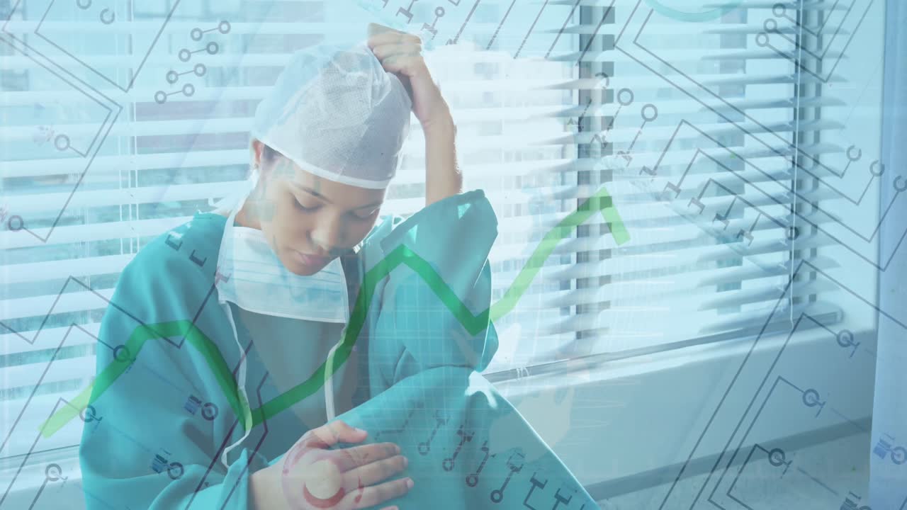 마이크로프로세서 연결의 애니메이션과 병원에서 스트레스를 받은 두 인종의 여성 외과 의사