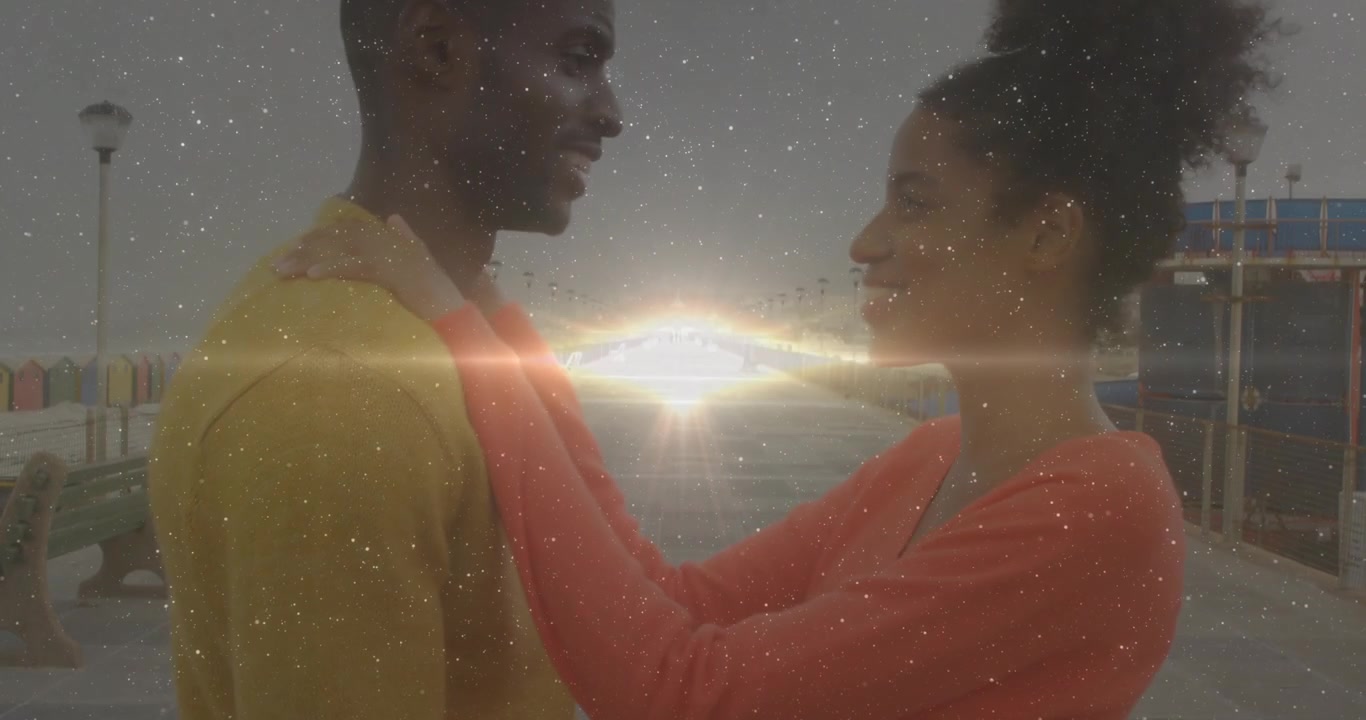 Pair leaning heads on pier right partner touching shoulders lens flare stars brightening romance ad