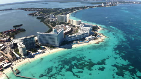 Hotel resorts and buildings on narrow caribbean coast in Canc&uacute;n city
