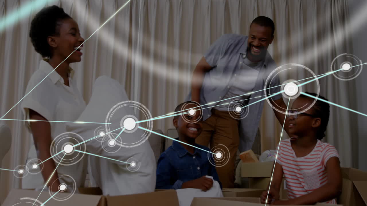 Network of connections animation over family unpacking boxes and laughing together