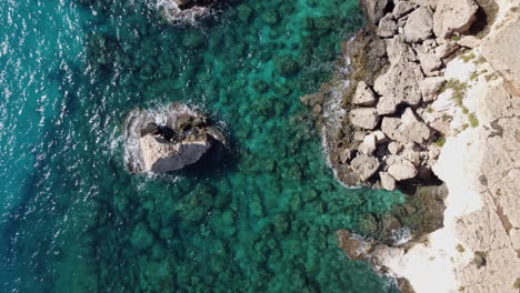 4k-Close-up-Drone-footage-of-rocky-beach-side