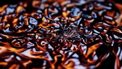 abstract rippling metallic fluid surface