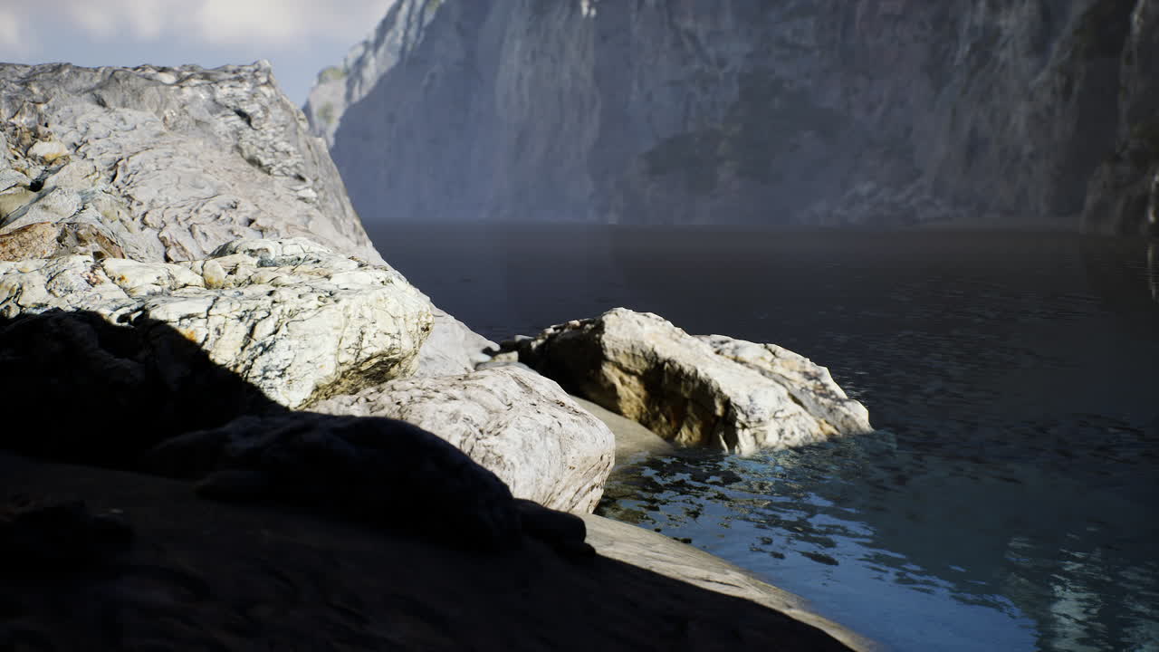 Tranquil bay at dawn surrounded by rocky cliffs in australia