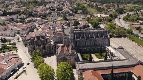 batalha monastery in leiria, portugal, on sunny day - circling, drone shot