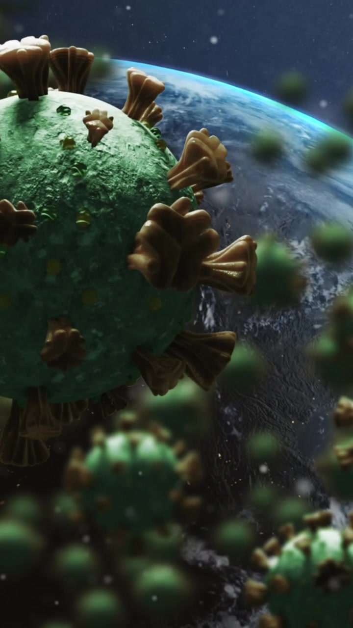 Animazione di cellule Covid-19 che si diffondono su un globo rotante.