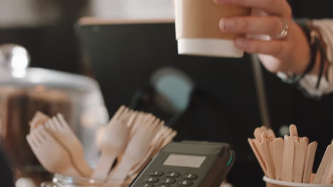 close up customer making contactless payment using smart watch mobile money transfer buying coffee in cafe enjoying service at restaurant