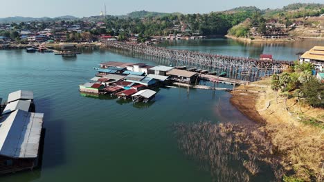 bird's-eye view of the mon port and its famous bridge, showcasing the bustling activity and iconic landmark of the mon community