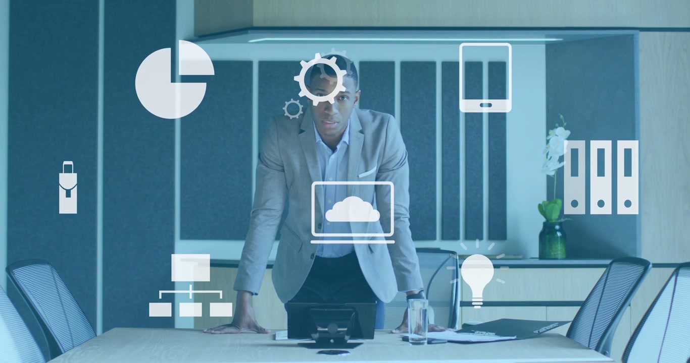 African American Businessman with Digital Interface in Modern Office