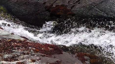 4k video of a powerful water flow from a mountain river in peru, lagunas of pichgacocha, ambo, huanco