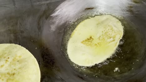 huarache mexican dish masa dough deep fried in oil, up close street food