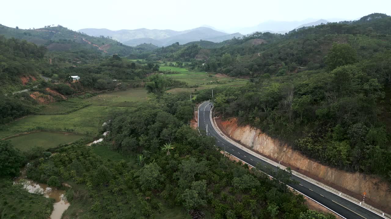 Mountain Road Through Valley Landscape