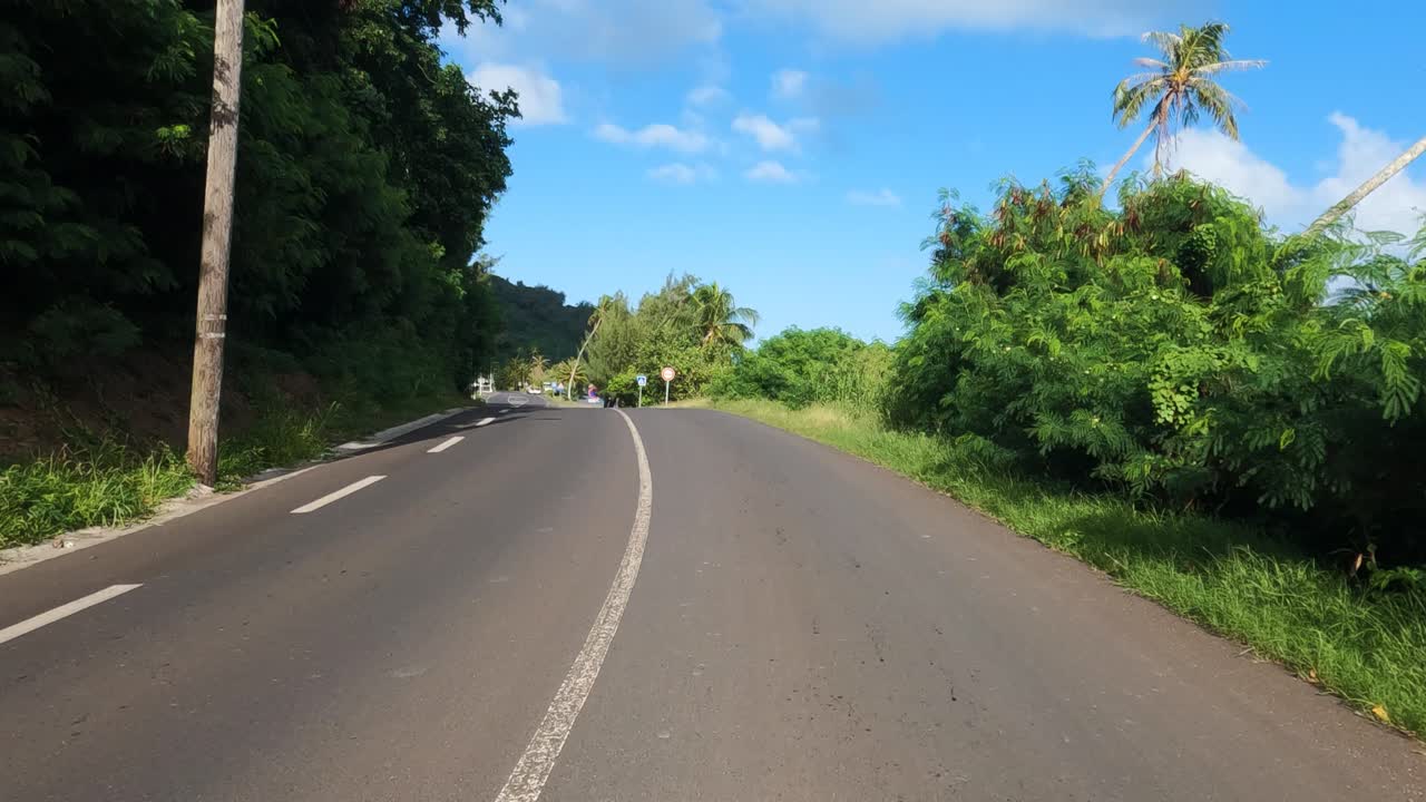 Driving on Coastal Road on Bora Bora Island, French Polynesia Point of View