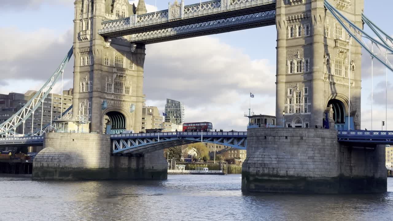 Traffic passing on Tower Bridge at Golden Hour (sunset) - London, UK