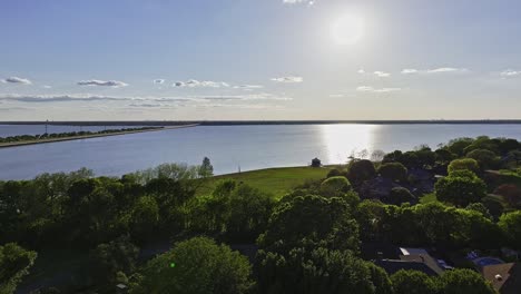 Flying-over-a-neighborhood-near-Lake-Ray-Hubbard-in-Rockwall,-Texas