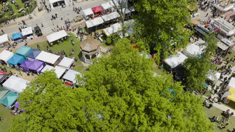 Dogwood-Festival-Booths-In-Siloam-Springs,-Arkansas,-USA---aerial-drone-shot