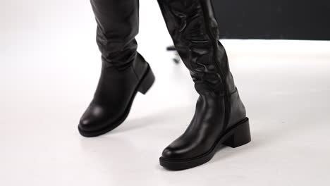 black over-the-knee leather boots