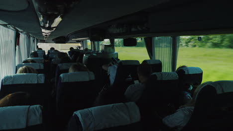 bus interior travelling through fields