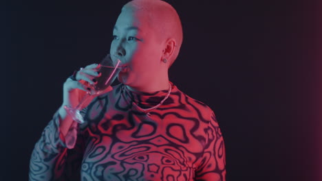 celebrating woman in neon light