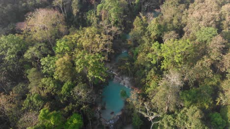 Aerial-view-of-famous-Kuang-si-waterfall-Loas-during-sunrise