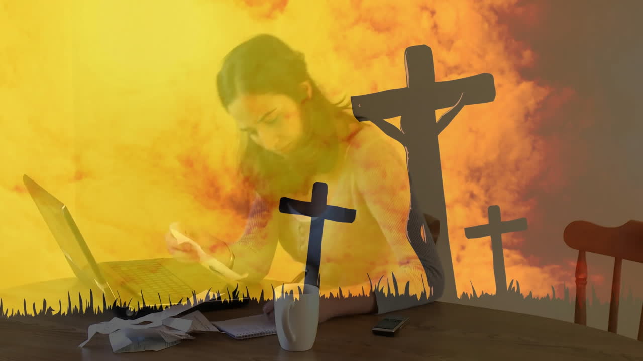 Working at desk, woman with cross silhouettes and fiery sky animation background