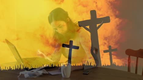 working at desk, woman with cross silhouettes and fiery sky animation background