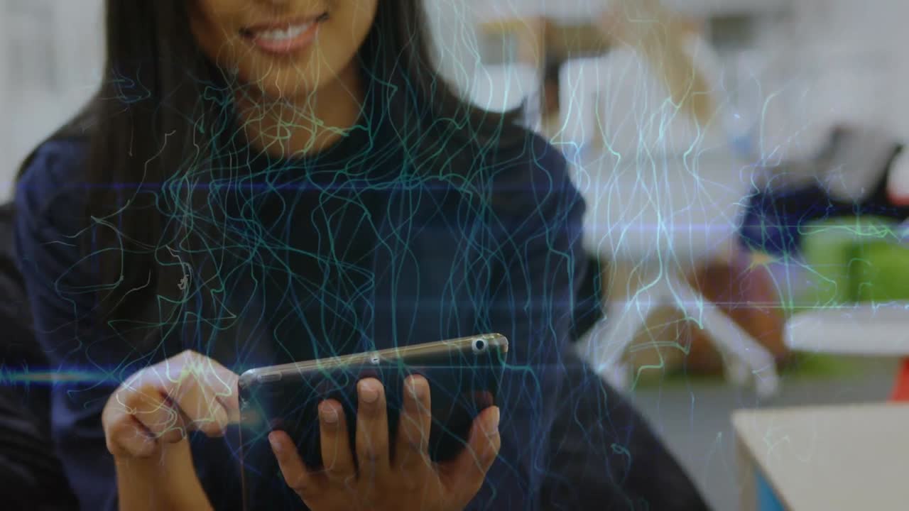 Animation of data processing over biracial businesswoman using tablet