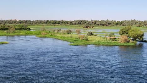 hut on an islet in the nile river