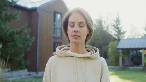 woman in a hoodie outdoors