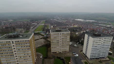 aerial footage view of high rise tower blocks, flats built in the city of stoke on trent to accommodate the increasing population, council housing crisis