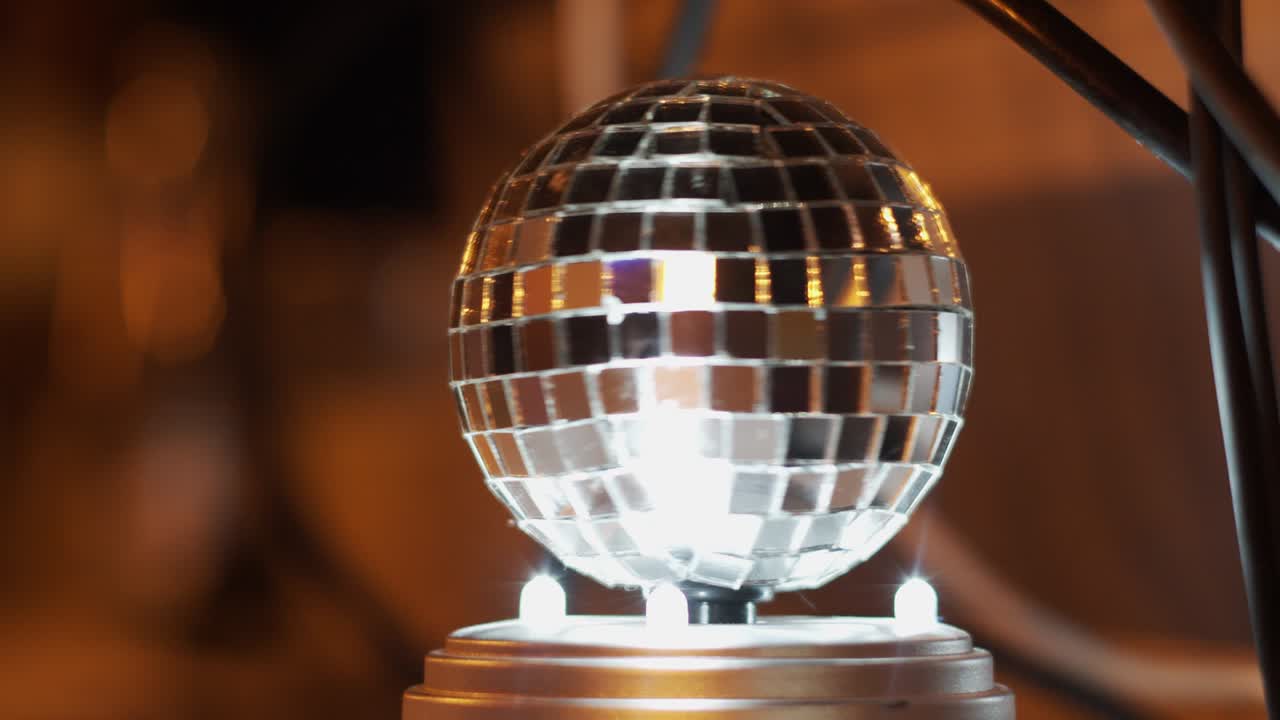 Disco ball rotating at night