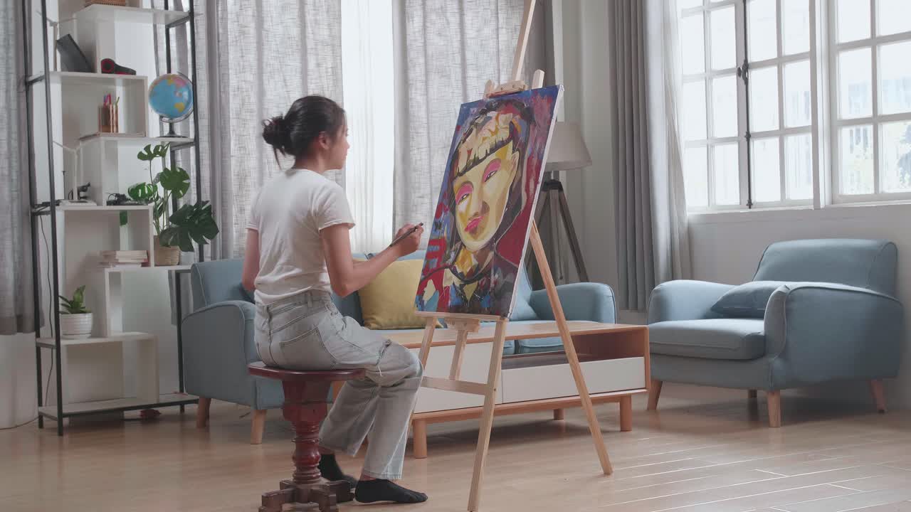 Woman Painting a Portrait at Home