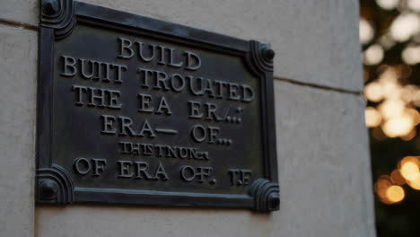 historic building facade with plaque