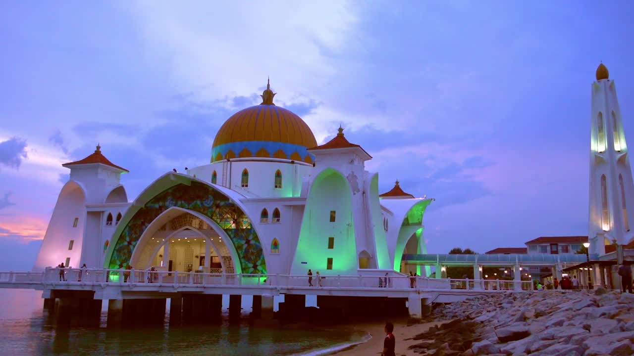 Stunning View Of A Mosque By The Beach In Melaka Kuala Lumpur, Malaysia At Sunset - slow motion shot