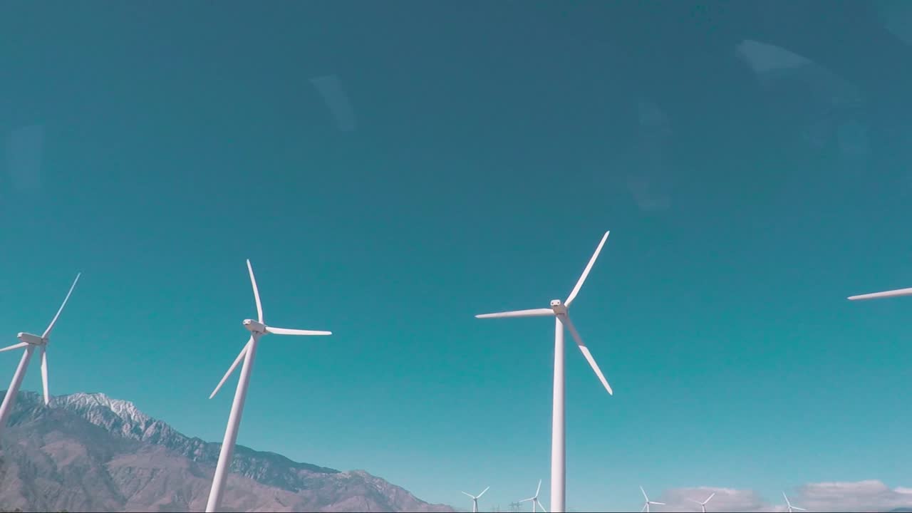 Driving past wind turbines in a wind farm in Southern California