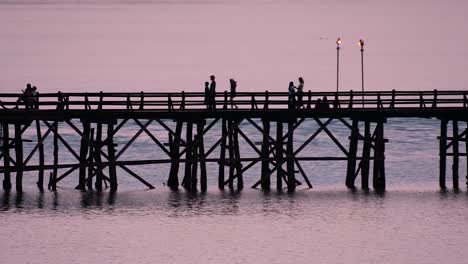 The-Mon-Bridge-is-an-old-wooden-bridge-located-in-Sangkla,-Thailand