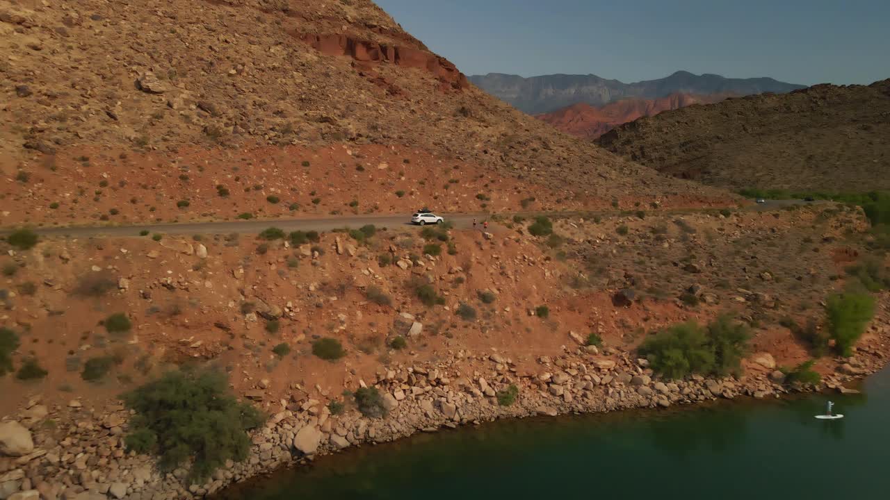 Stunning Aerial View of Red Rock Lake with Paddleboarders