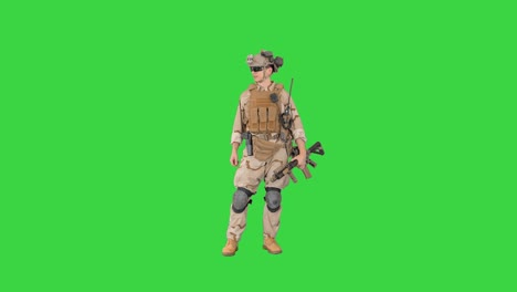 young usa ranger standing in a casual pose and talking on a green screen, chroma key