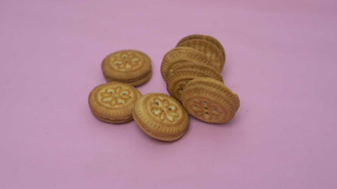 roze achtergrond rollende koekjes weids uitzicht