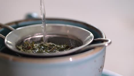 top view of pouring natural herbal tea