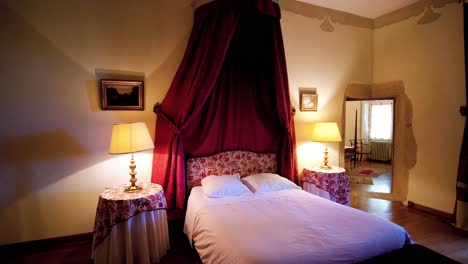 in luxurious chateau chamber, sleeping bed cocooned in ambient lighting offers a sanctuary of relaxation and opulence