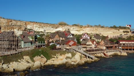 wooden houses at theme park village at popeye in anchor bay, island of malta