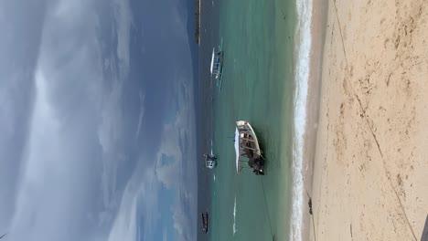 Vertical-clip-of-boats-on-Bali's-shores